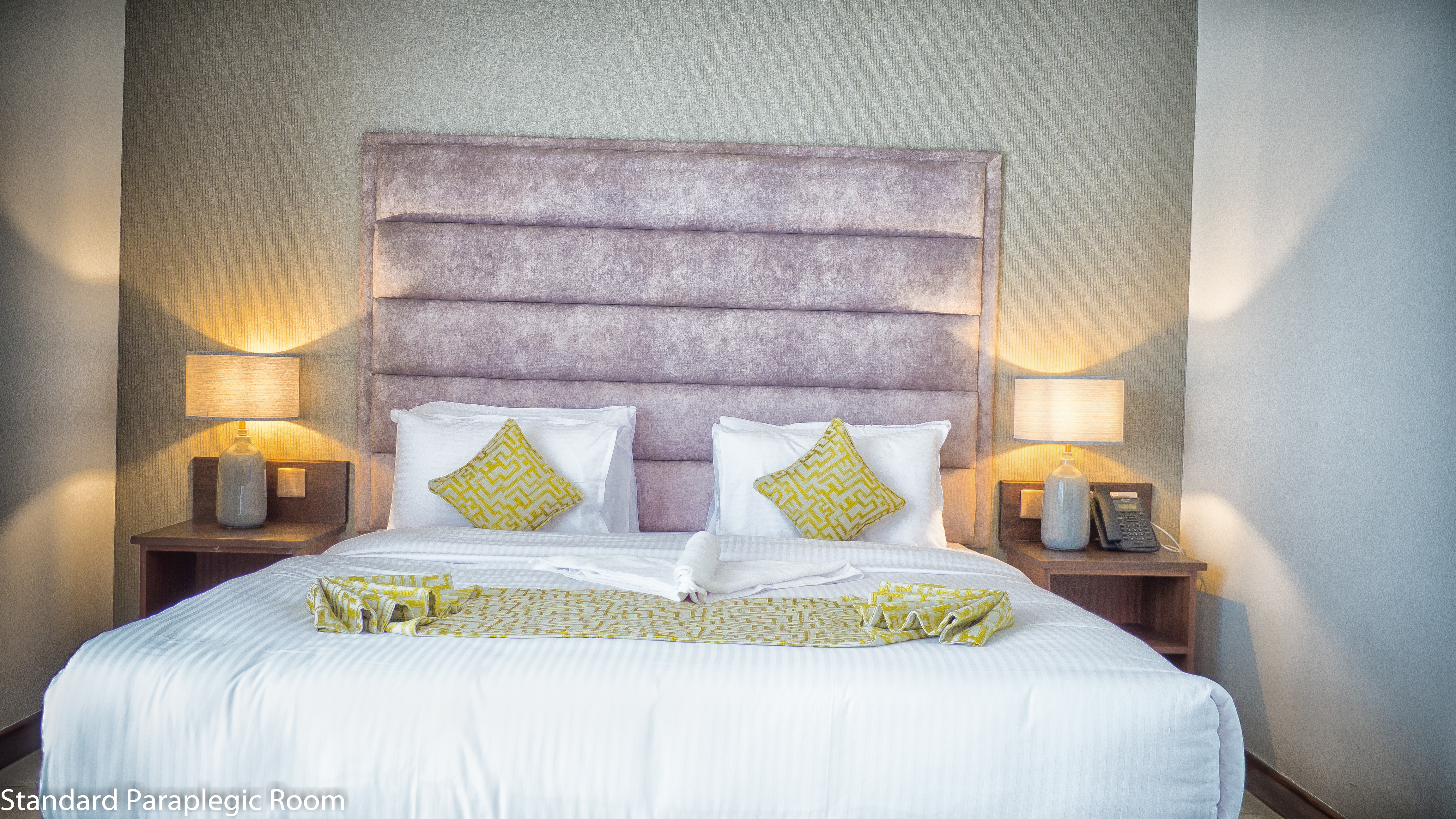 A cozy room with two twin-sized beds