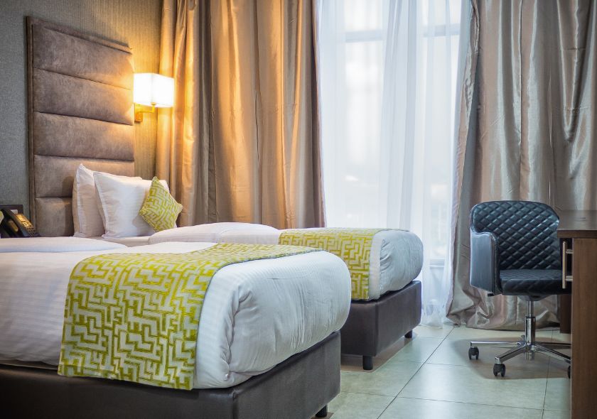 Spacious room featuring a king-sized bed.
